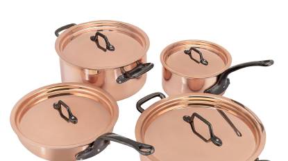 Matfer Bourgeat 915901 8‑Piece Copper Cookware Set displayed with copper lids and cast iron handles