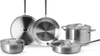 Misen 5-Ply Stainless Steel 9-Piece Cookware Set arranged on a modern kitchen countertop showing skillets, saucepans, and stockpot