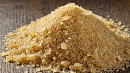 Palm Sugar crushed in a pile on a table