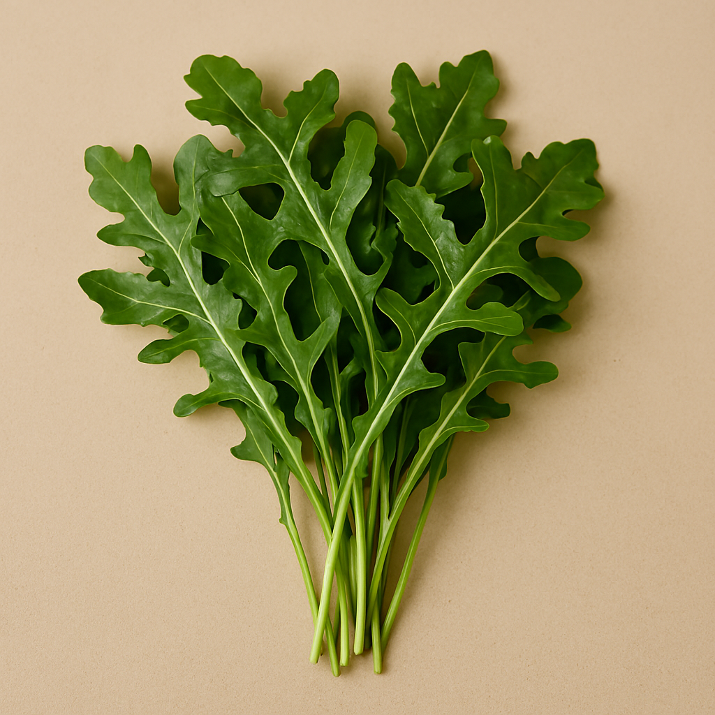 A bunch of fresh arugula leaves sits on a neutral beige kitchen surface. The vibrant green leaves are lobed and slightly glossy, with visible water droplets and pale green stems. Soft lighting enhances the texture and natural curves of the leaves.